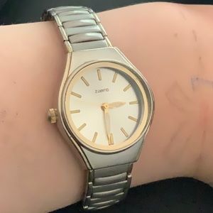 Silver / gold coloured watch - not sure of the brand -